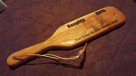 Made from premium black crazy horse leather, this <b>paddle</b> is a testament to both craftsmanship and allure. . Spanking paddle